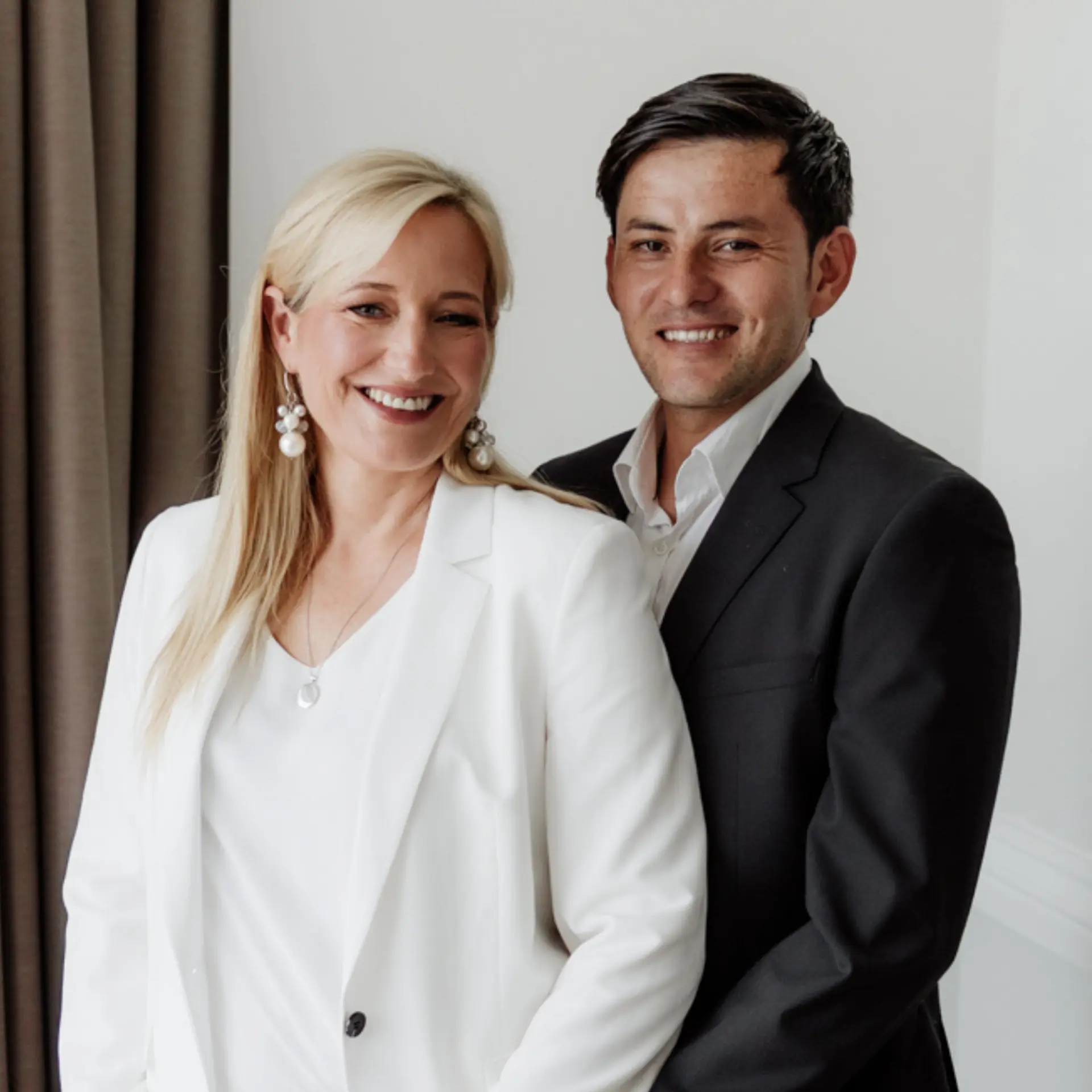 The founding partners of Akbari Worldwide Solutions